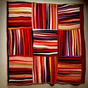 It’s a colorful rug or you can use it as a picture on your wall It feels soft.